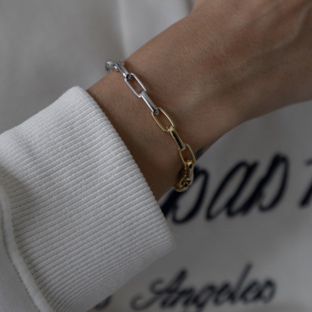 Ursula bracelet – two-tone gold and silver link chain on wrist - Luiza Jewelry