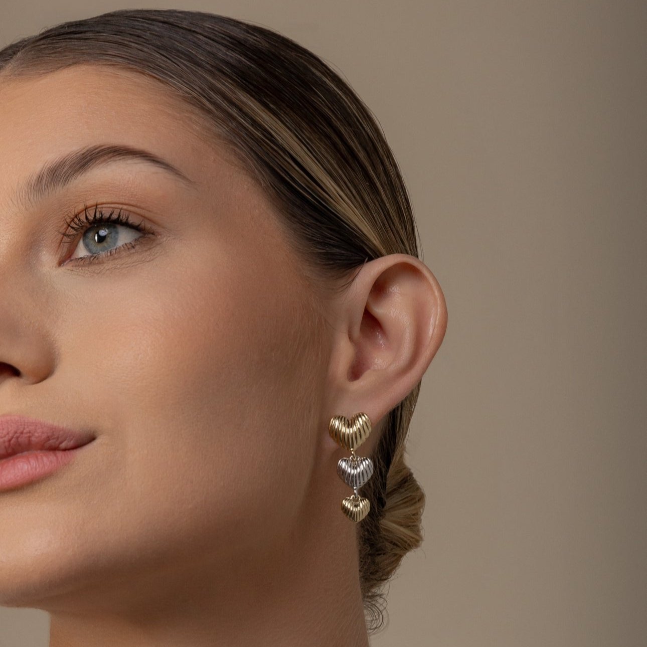 Samia earring with gold and silver hearts – mixed metal drop earring handcrafted in Brazil