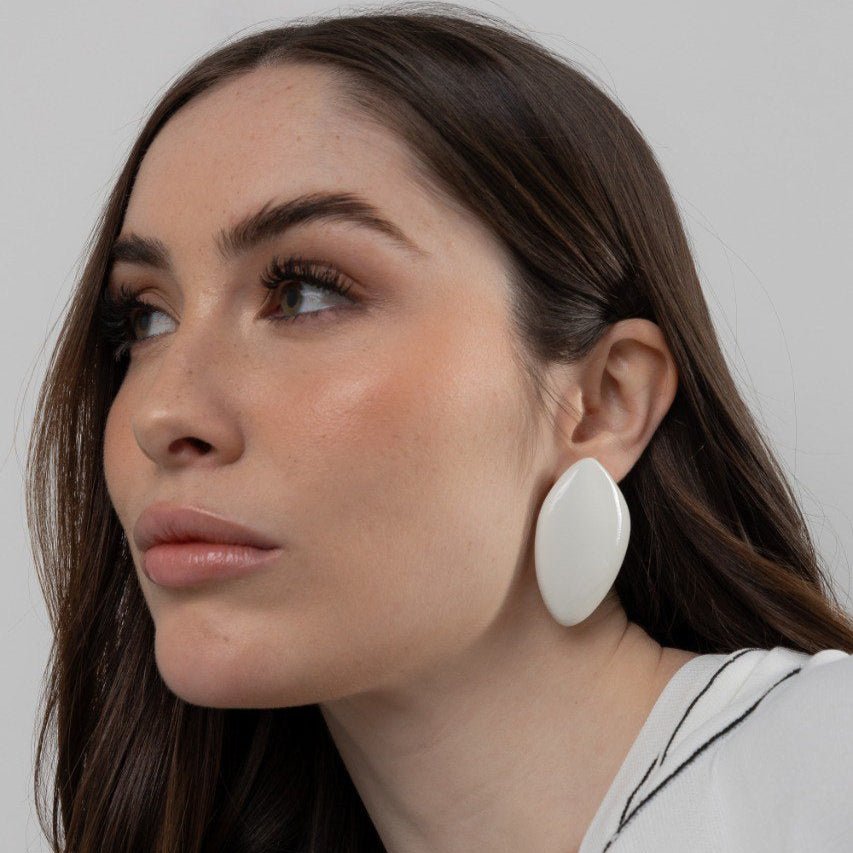 Model wearing Avery earring in white resin – 6.5 cm statement design