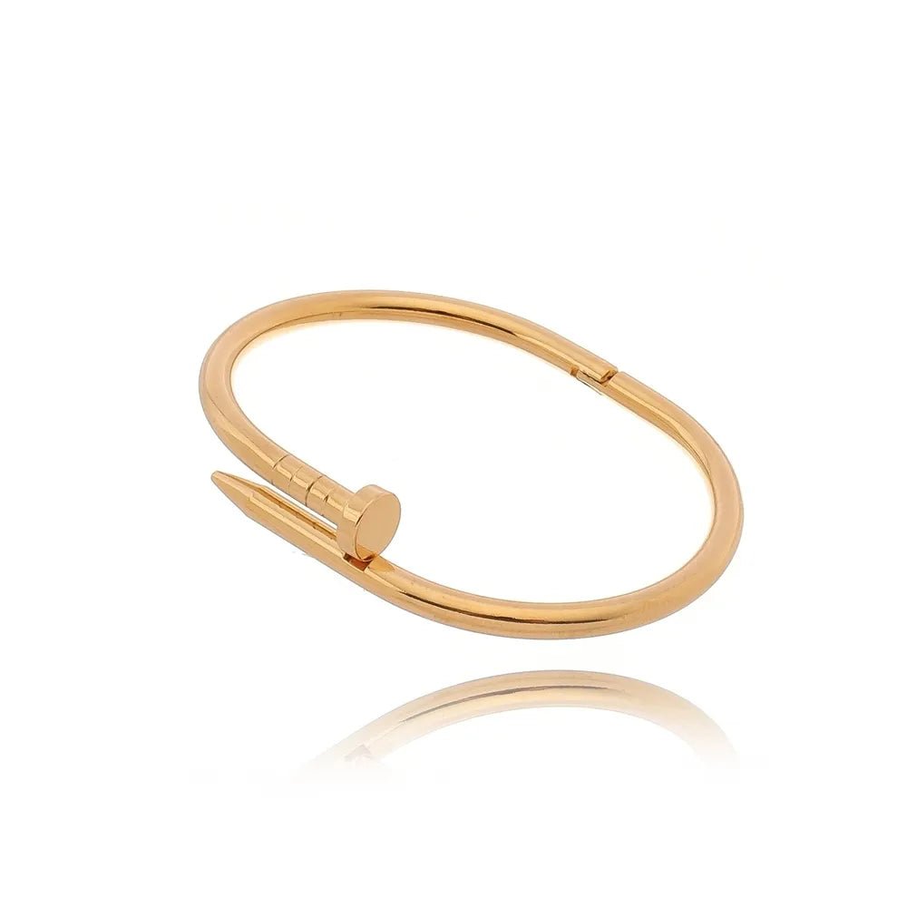 Gold nail-shaped bracelet with snap closure – Telma by Luiza Jewelry