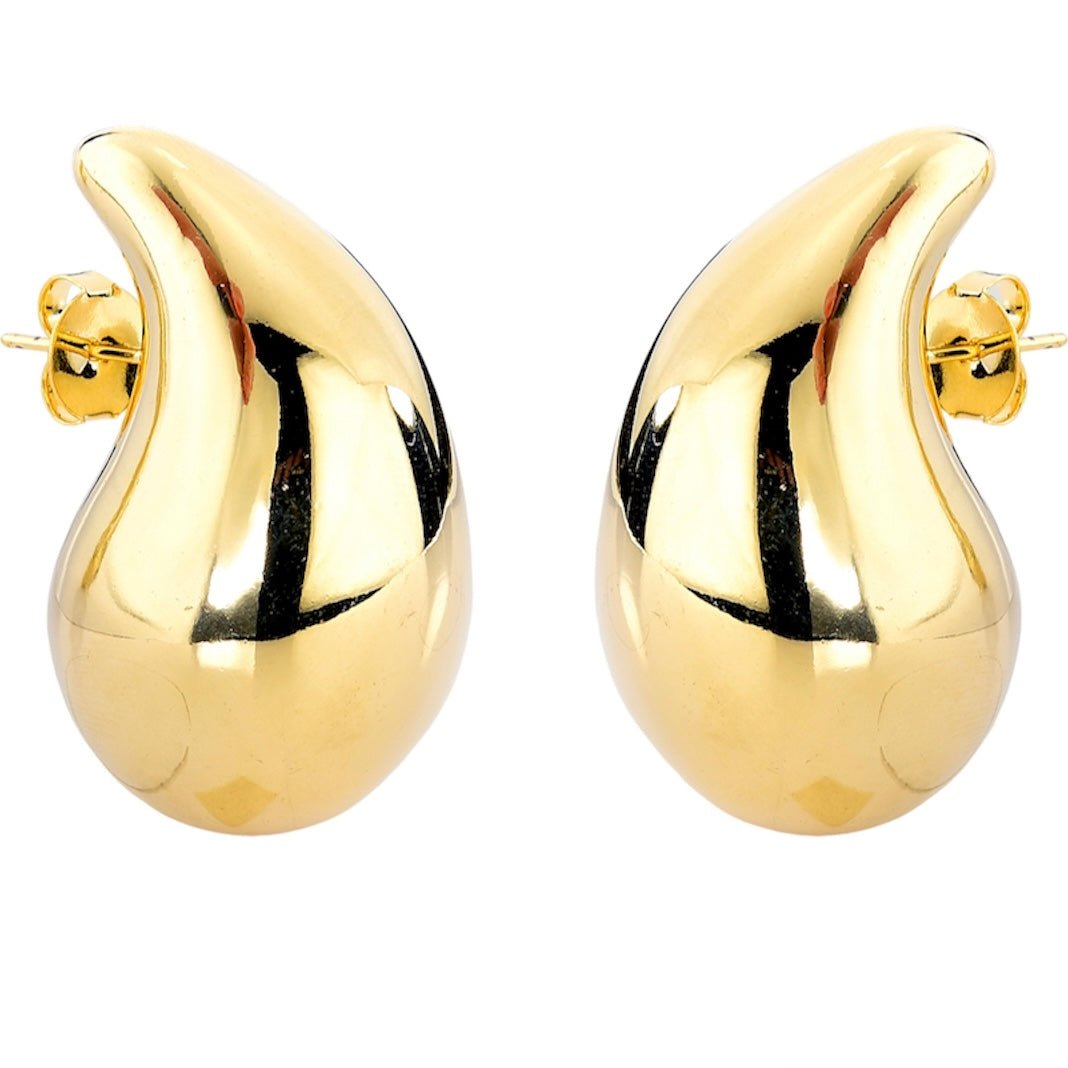 Bold gold sculptural drop earrings with organic curves – Pamela earring by Luiza Jewelry