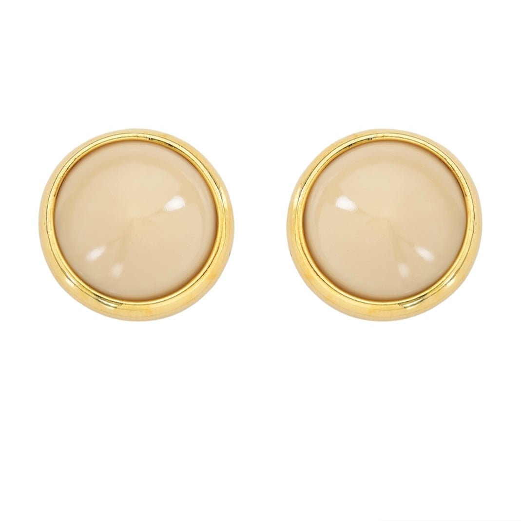 Close-up of Grace nude resin stud earrings with gold trim – 10 mm