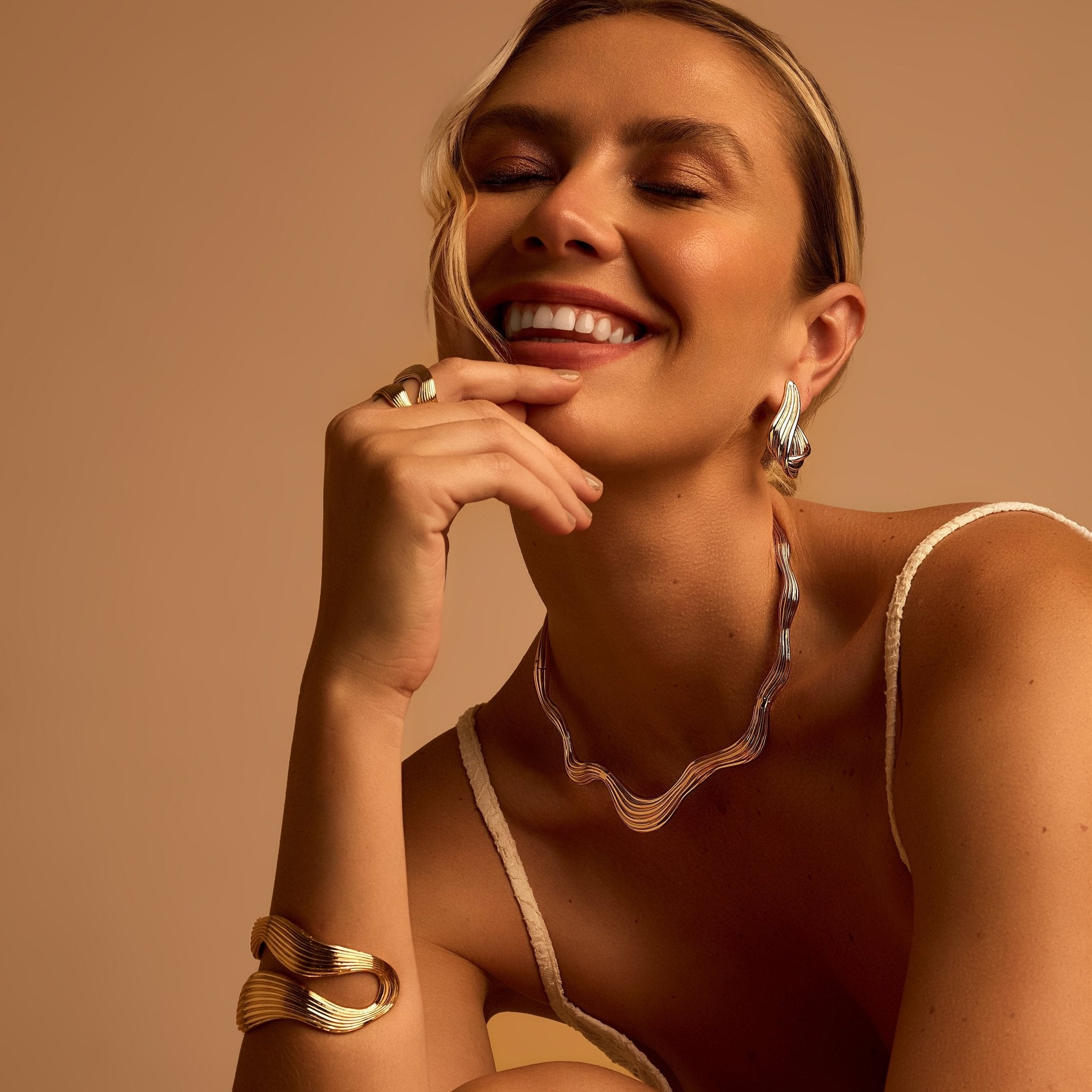 Livy Ring: Sculpted Wave Gold Ring - Luiza Jewelry